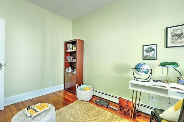 10 Westcott Ave Unit 1, Boston, MA 02124 - office area with baseboards and hardwood / wood-style floors