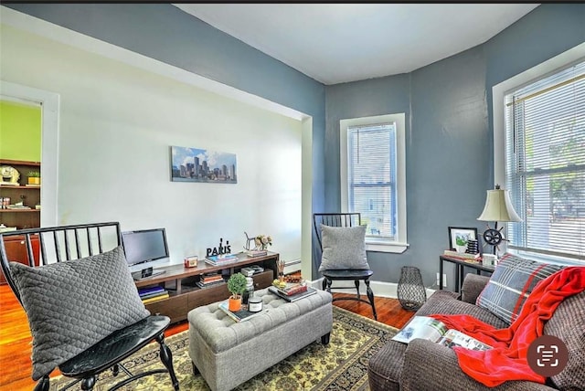 10 Westcott Ave Unit 1, Boston, MA 02124 - office area with wood finished floors and a baseboard radiator