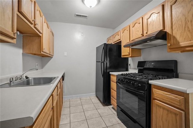 132 Fordson Ave Unit 11, Cranston, RI 02910 - kitchen featuring under cabinet range hood, black appliances, a sink, light tile patterned flooring, and light countertops