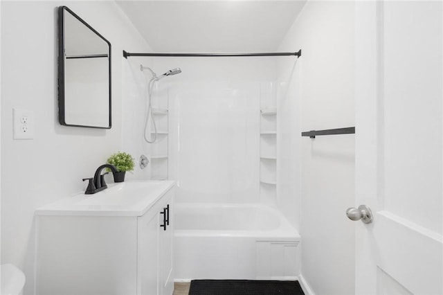bathroom featuring vanity and tub / shower combination