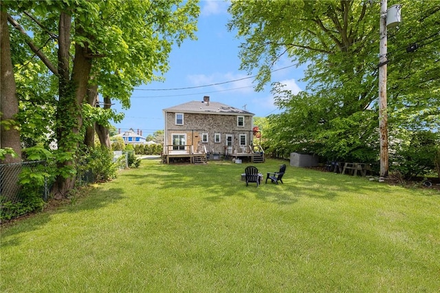view of yard with a deck