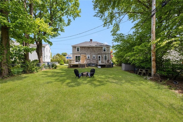 view of yard featuring a deck