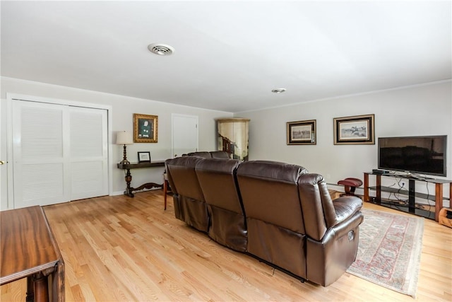 103 Carrs Pond Rd, West Greenwich, RI 02817 - living area featuring light wood finished floors and baseboards