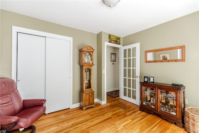 103 Carrs Pond Rd, West Greenwich, RI 02817 - living area with light wood-style floors and baseboards