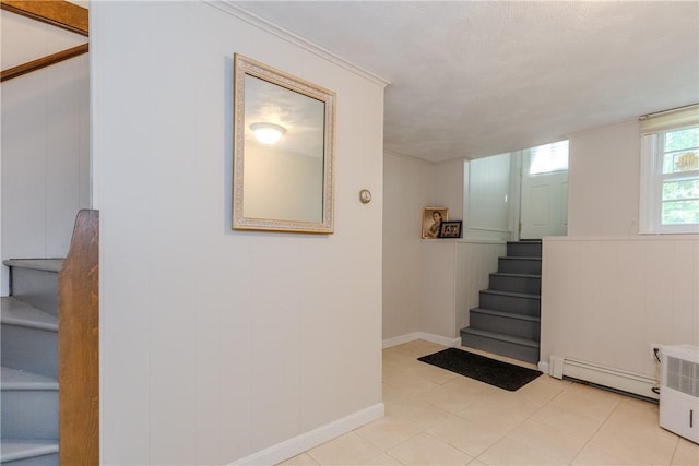 103 Carrs Pond Rd, West Greenwich, RI 02817 - staircase with baseboard heating and a decorative wall