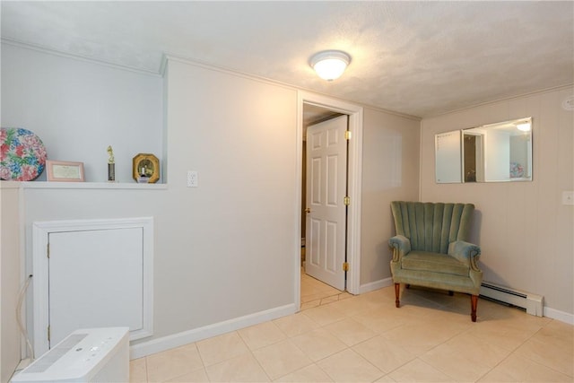 103 Carrs Pond Rd, West Greenwich, RI 02817 - living area featuring a baseboard radiator, baseboards, and light tile patterned flooring