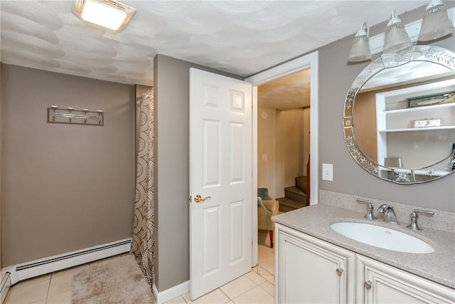 103 Carrs Pond Rd, West Greenwich, RI 02817 - full bathroom with a baseboard radiator, tile patterned floors, and vanity