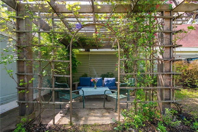 view of patio featuring a pergola and outdoor lounge area