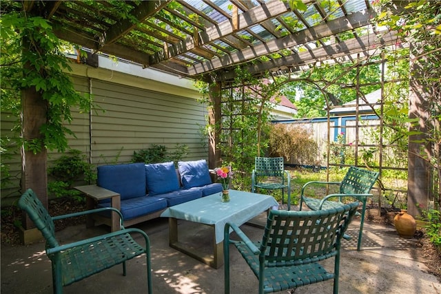 view of patio / terrace with outdoor lounge area, a pergola, and fence
