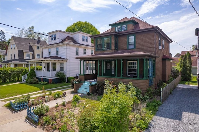 traditional style home with covered porch