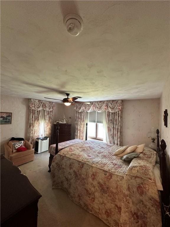 bedroom featuring carpet flooring and ceiling fan