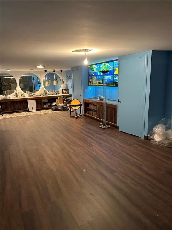 living area featuring dark wood-type flooring