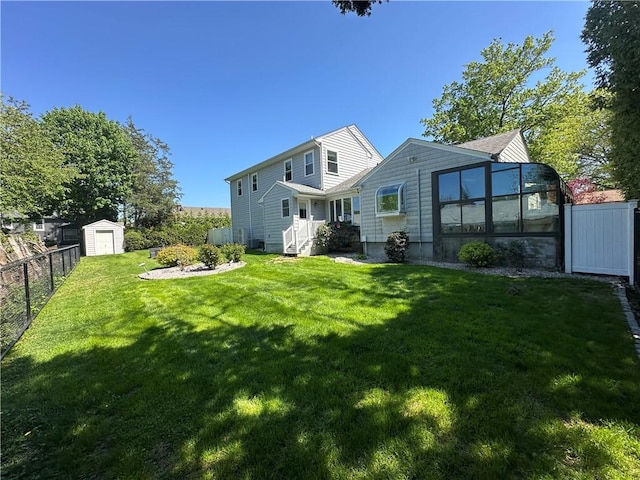 back of property featuring a storage shed and an outdoor structure