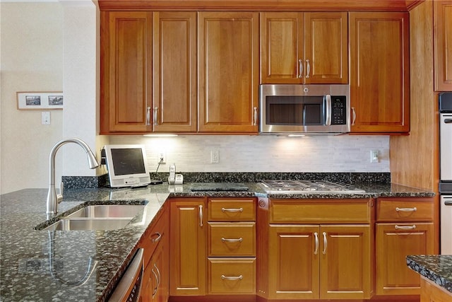 43 Waters Edge, Tiverton, RI 02878 - kitchen with stainless steel appliances, a sink, and brown cabinets