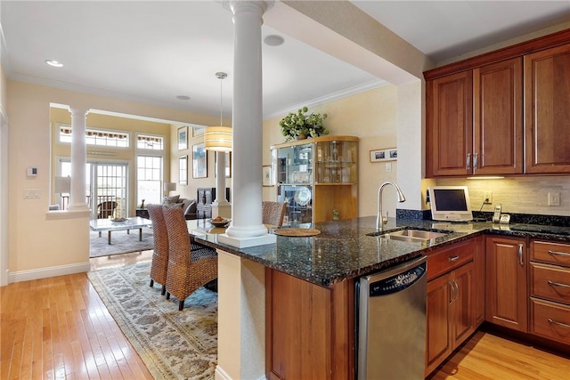43 Waters Edge, Tiverton, RI 02878 - kitchen featuring dishwasher, a sink, ornate columns, light wood-style floors, and crown molding