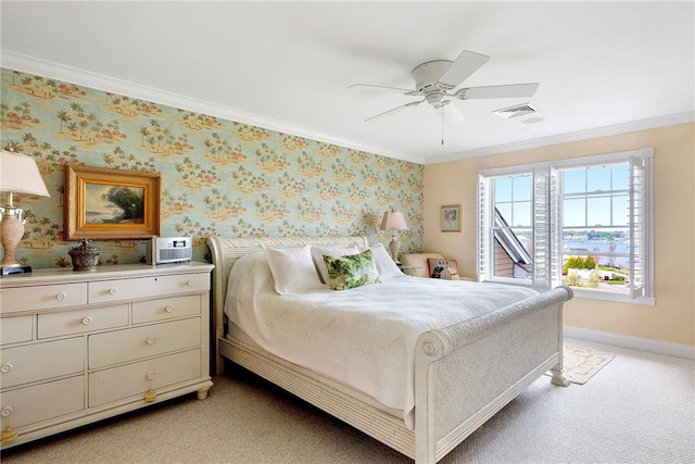 43 Waters Edge, Tiverton, RI 02878 - bedroom featuring ornamental molding, baseboards, light colored carpet, wallpapered walls, and ceiling fan