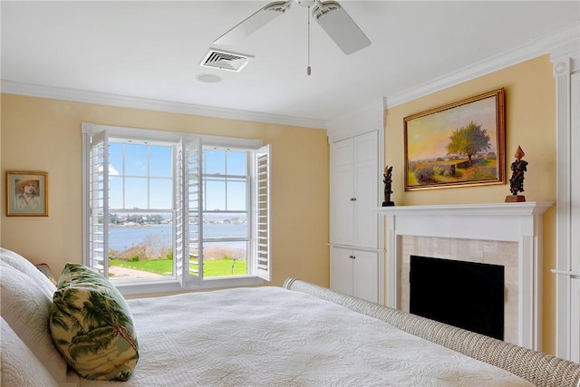 43 Waters Edge, Tiverton, RI 02878 - bedroom featuring crown molding, a water view, a fireplace, and ceiling fan