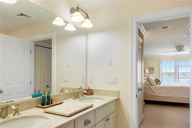 43 Waters Edge, Tiverton, RI 02878 - ensuite bathroom with double vanity and a ceiling fan