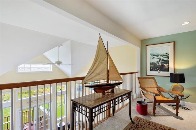 43 Waters Edge, Tiverton, RI 02878 - living area featuring ceiling fan, carpet flooring, a towering ceiling, and baseboards