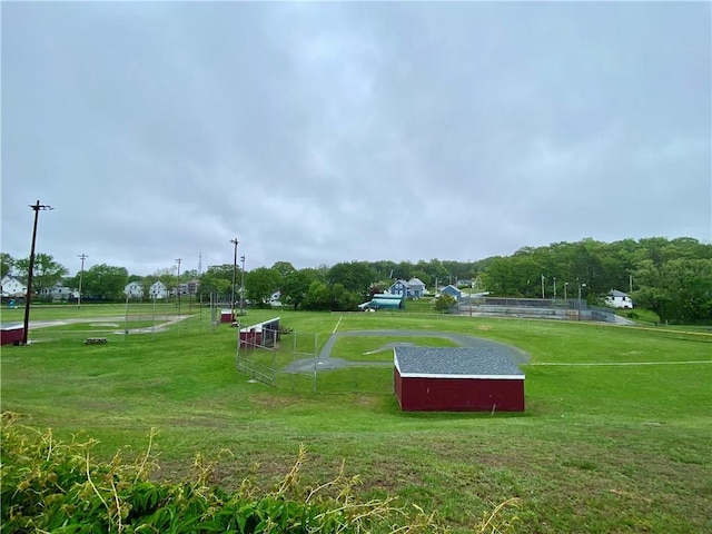 view of home's community with an outbuilding