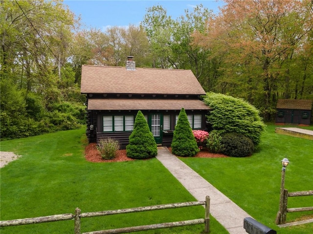 4 Ottawa Trl, Narragansett, RI 02882 - view of front of home featuring roof with shingles and a chimney
