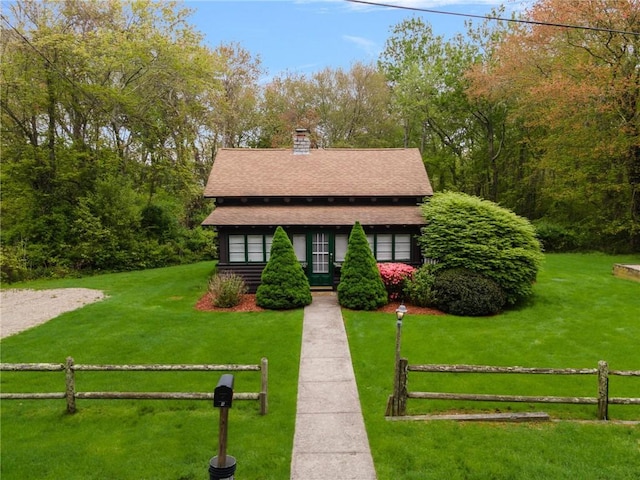 4 Ottawa Trl, Narragansett, RI 02882 - view of front of property with a chimney and a shingled roof