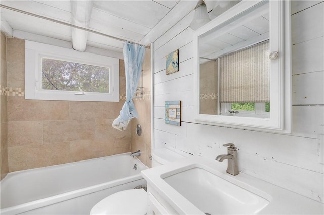 4 Ottawa Trl, Narragansett, RI 02882 - bathroom featuring a sink, toilet, and shower / bath combination with curtain