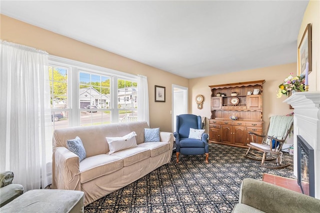 146 Bay View Ave, Bristol, RI 02809 - carpeted living room featuring a glass covered fireplace