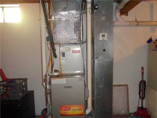 utility room with heating unit