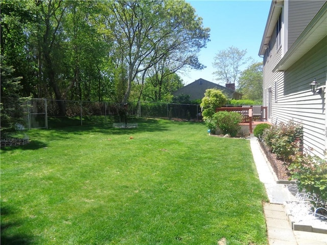 view of yard featuring a deck