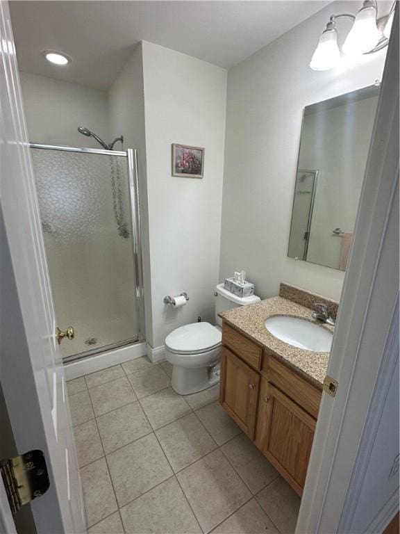 19 Calabria Ct Unit 19, Westerly, RI 02891 - full bathroom with tile patterned floors, a shower stall, toilet, and vanity