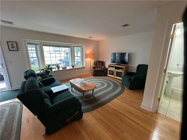 19 Calabria Ct Unit 19, Westerly, RI 02891 - living area featuring wood finished floors and baseboards