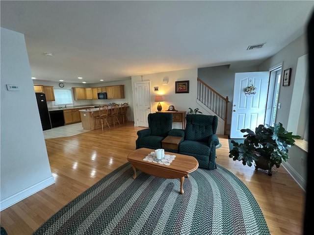 19 Calabria Ct Unit 19, Westerly, RI 02891 - living room with stairway, light wood-style flooring, recessed lighting, and baseboards