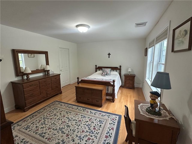 19 Calabria Ct Unit 19, Westerly, RI 02891 - bedroom with light wood-style floors and baseboards