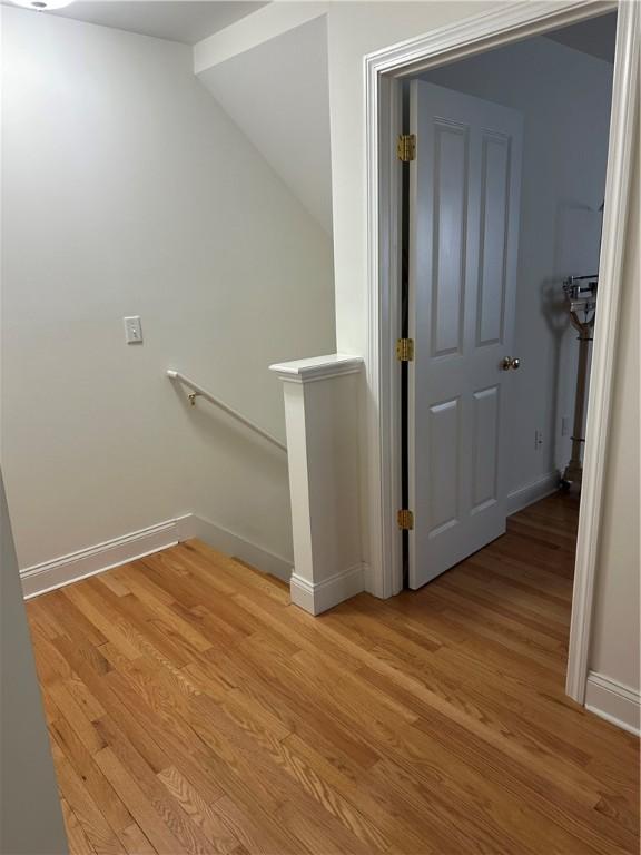 19 Calabria Ct Unit 19, Westerly, RI 02891 - stairs featuring wood finished floors and baseboards