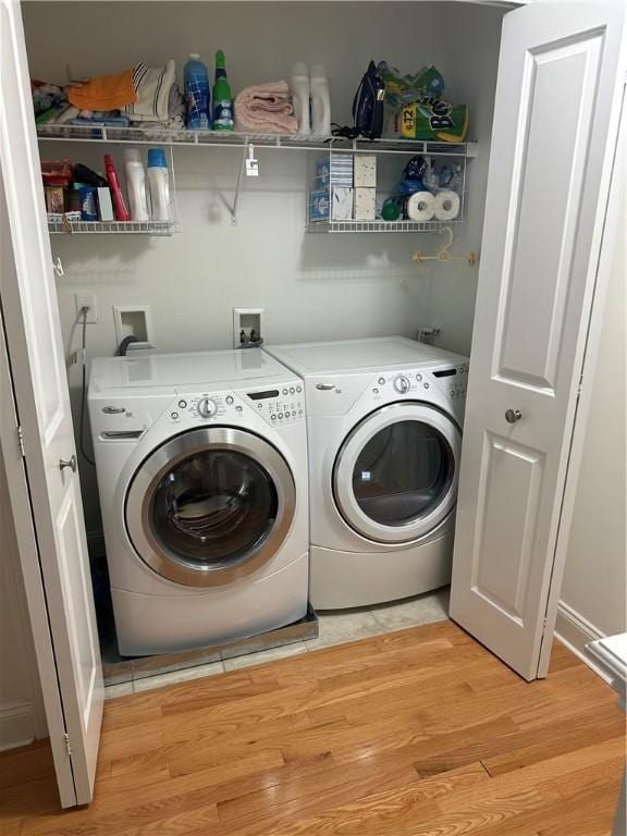 19 Calabria Ct Unit 19, Westerly, RI 02891 - laundry room featuring washer and dryer and light wood-style floors