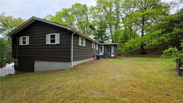 22 Winsor Ave, Johnston, RI 02919 - view of home's exterior with a yard and cooling unit