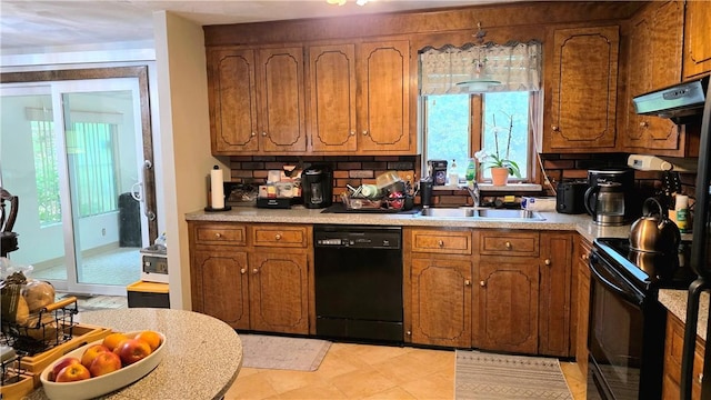 22 Winsor Ave, Johnston, RI 02919 - kitchen featuring black appliances, a sink, brown cabinets, and light countertops