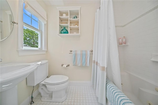 9 Casey Ct, Newport, RI 02840 - full bathroom featuring baseboards, toilet, shower / bath combo, and a sink