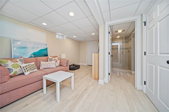 9 Casey Ct, Newport, RI 02840 - living area featuring a drop ceiling, light wood-style floors, recessed lighting, and baseboards