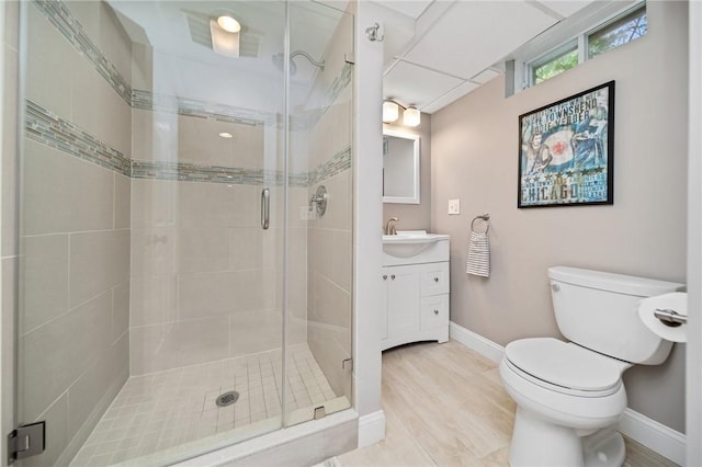 9 Casey Ct, Newport, RI 02840 - full bathroom with baseboards, toilet, vanity, and a shower stall