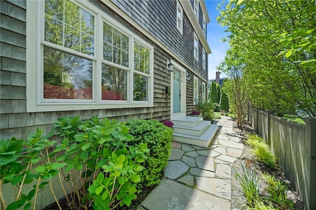 9 Casey Ct, Newport, RI 02840 - view of property exterior featuring fence and entry steps