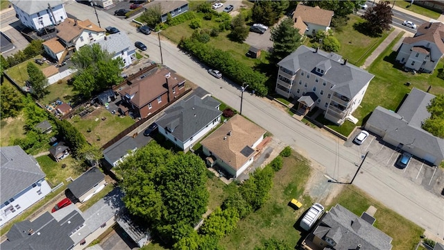 aerial view of property and surrounding area with nearby suburban area