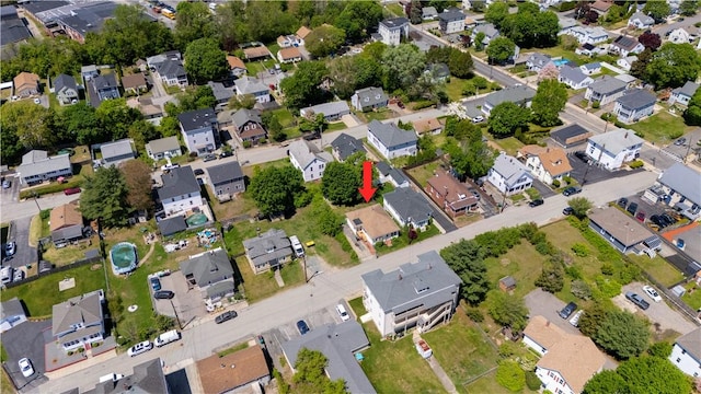 aerial overview of property's location with nearby suburban area