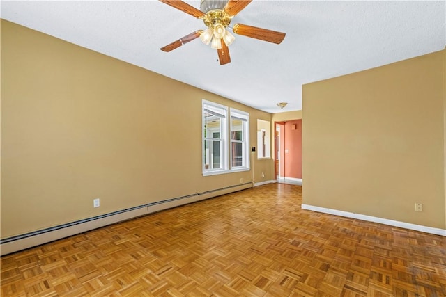 unfurnished room featuring a baseboard heating unit, baseboards, and ceiling fan