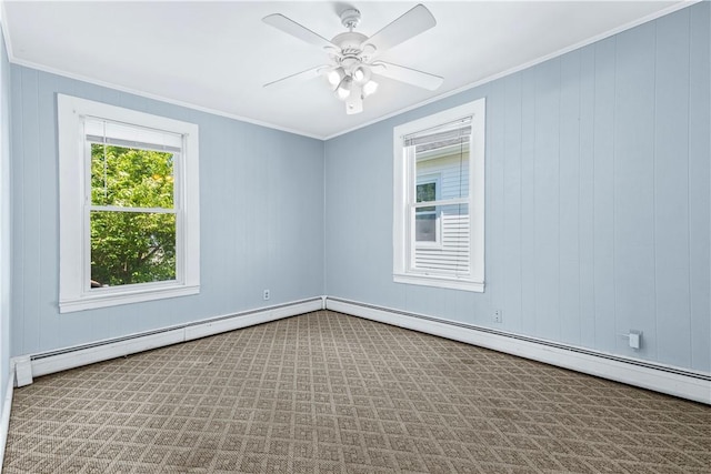 spare room with ornamental molding, carpet, a ceiling fan, and a baseboard radiator