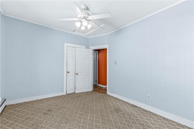 unfurnished room with ceiling fan, light colored carpet, ornamental molding, baseboards, and a baseboard heating unit
