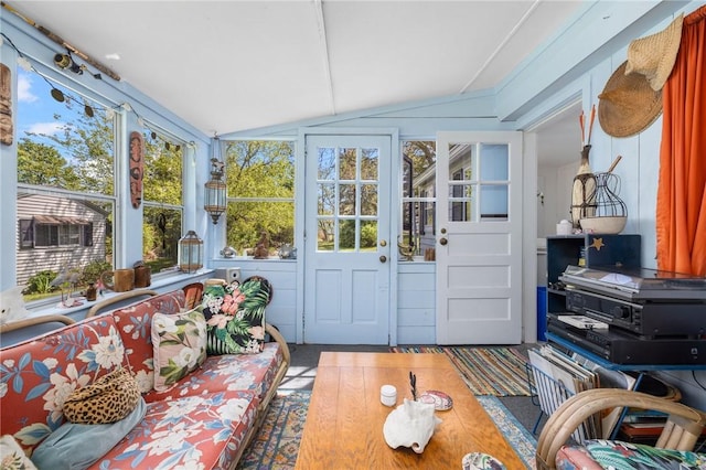 sunroom / solarium with vaulted ceiling