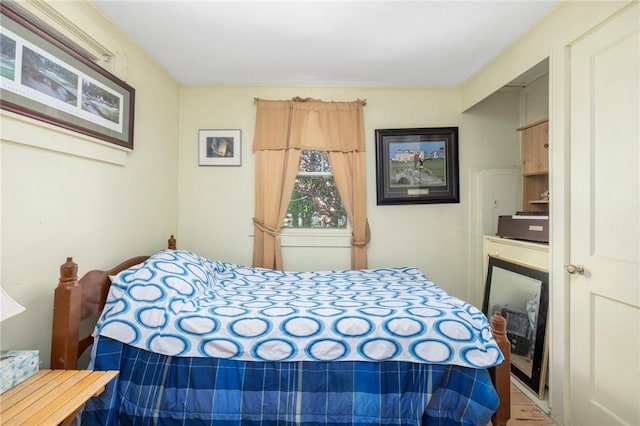 bedroom featuring crown molding
