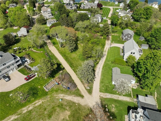 aerial view of property's location featuring nearby suburban area